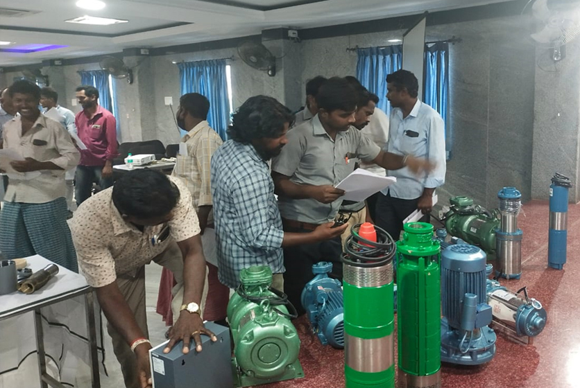 Taro Pumps sales manager explaining Taro products to dealers