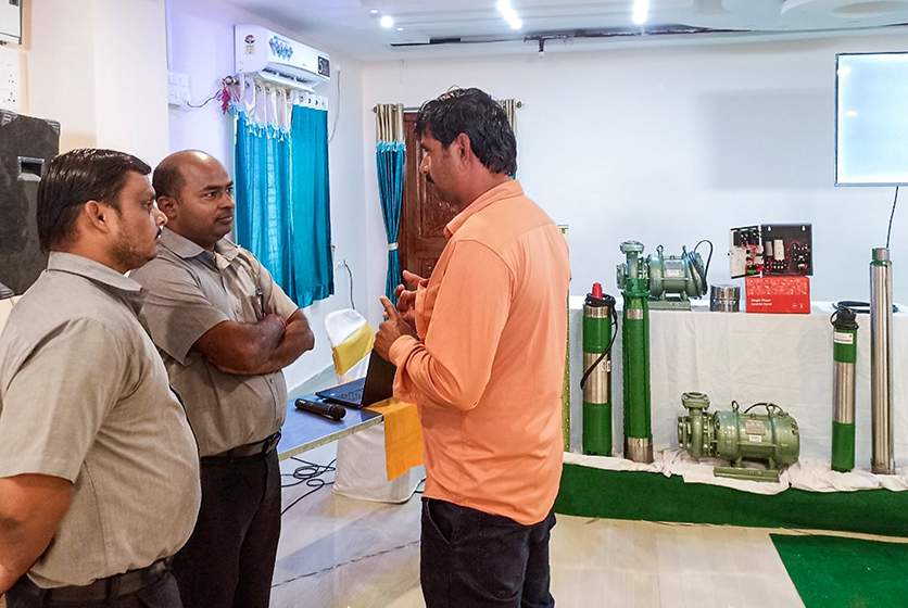 Taro Pumps sales managers explaining Taro products to mechanic