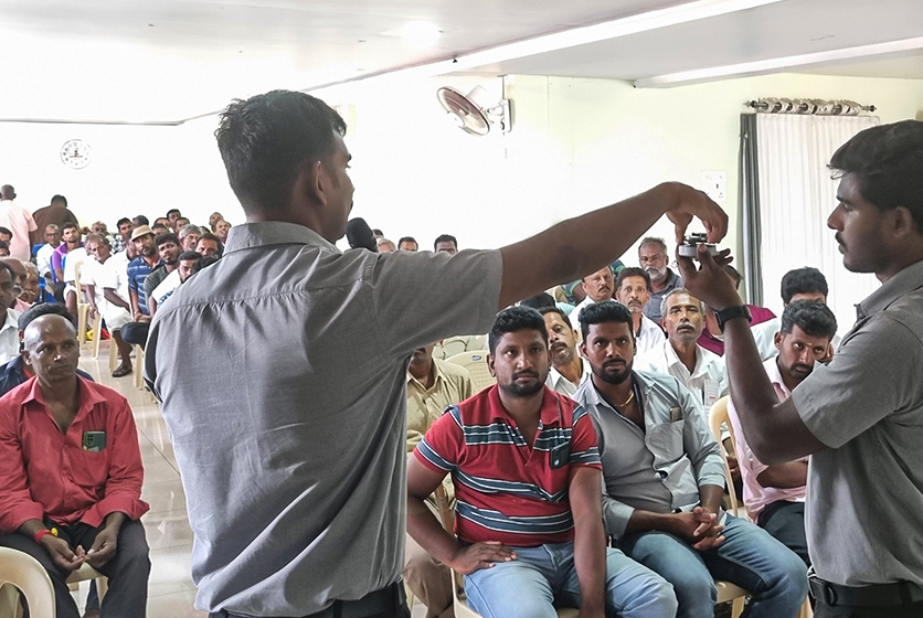 Taro Pumps manager explaining Taro Pumps products to mechanics