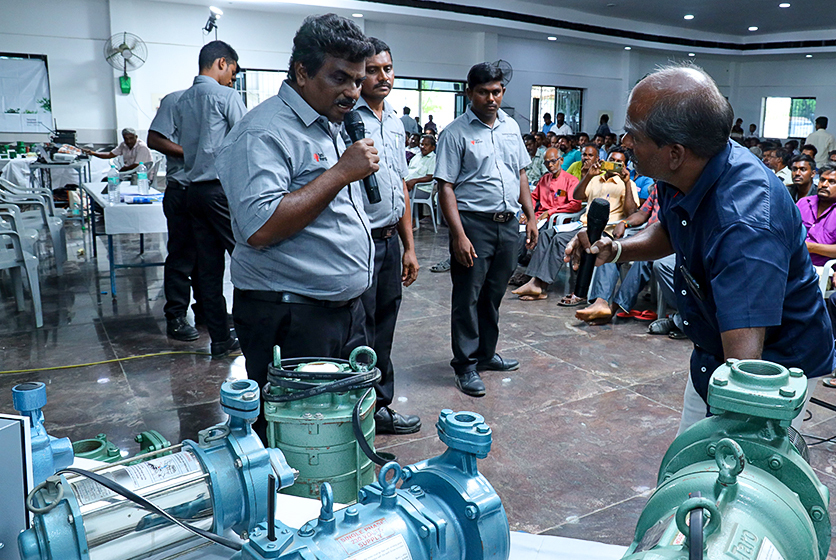 Taro Pumps manager explaining Taro Pumps products to mechanics