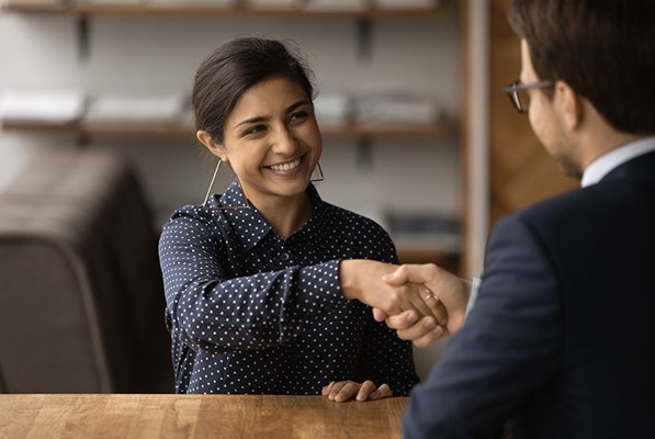 Two professionals shaking hands