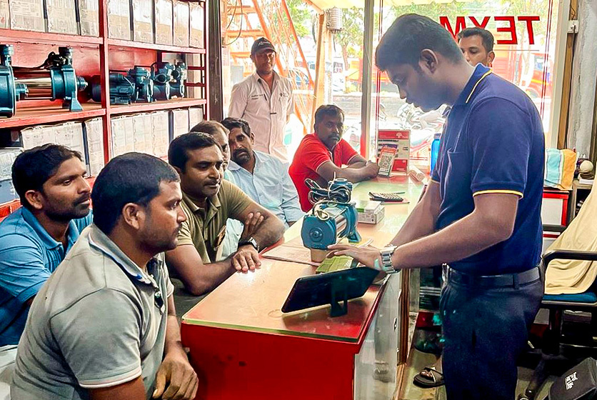 Taro Pumps manager explaining Taro Pumps products to mechanics