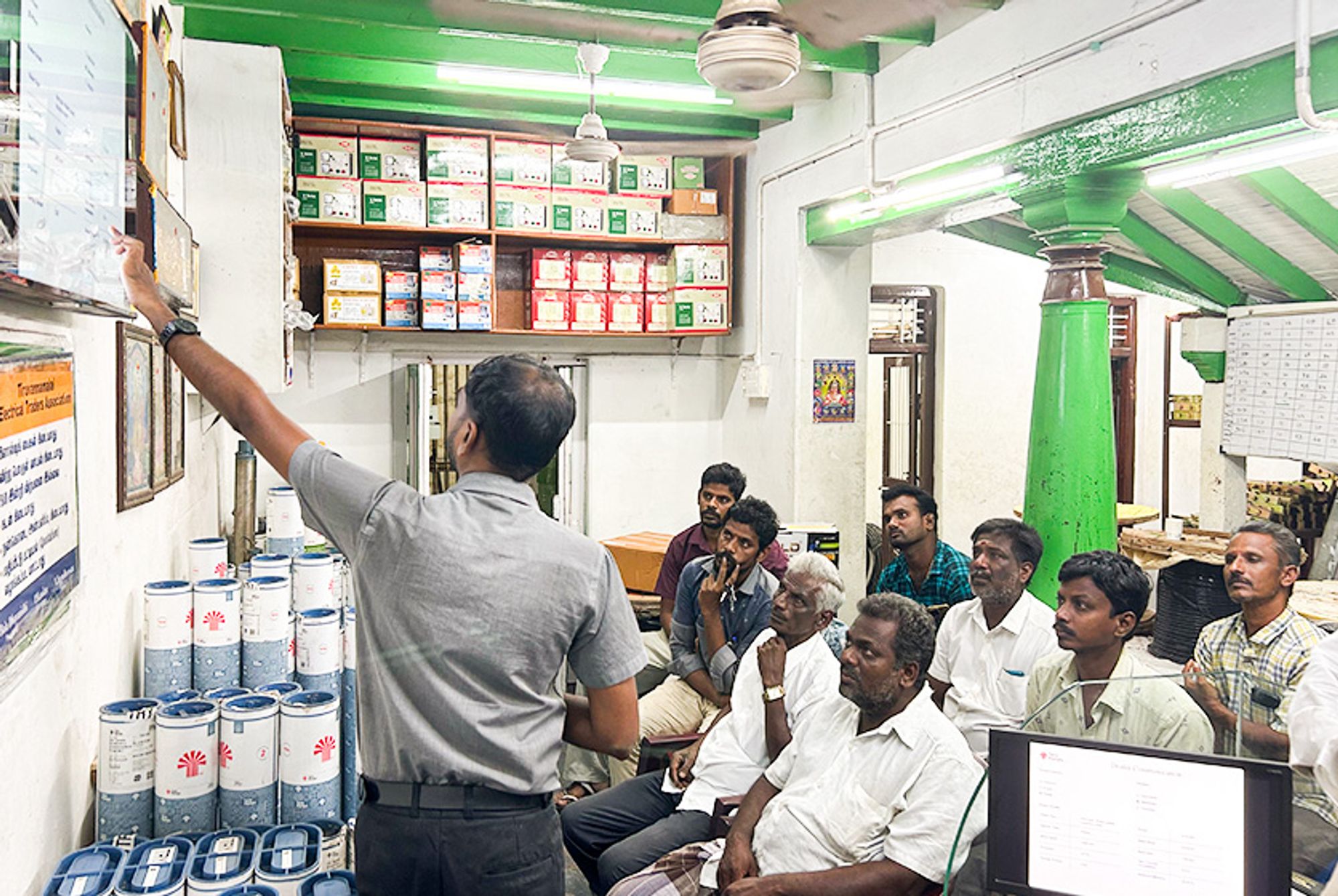 Taro Pumps manager explaining Taro Pumps products to mechanics